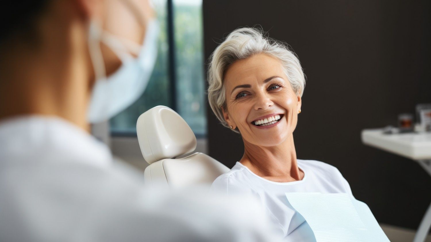 Smiling patient during family dental care visit in Toronto