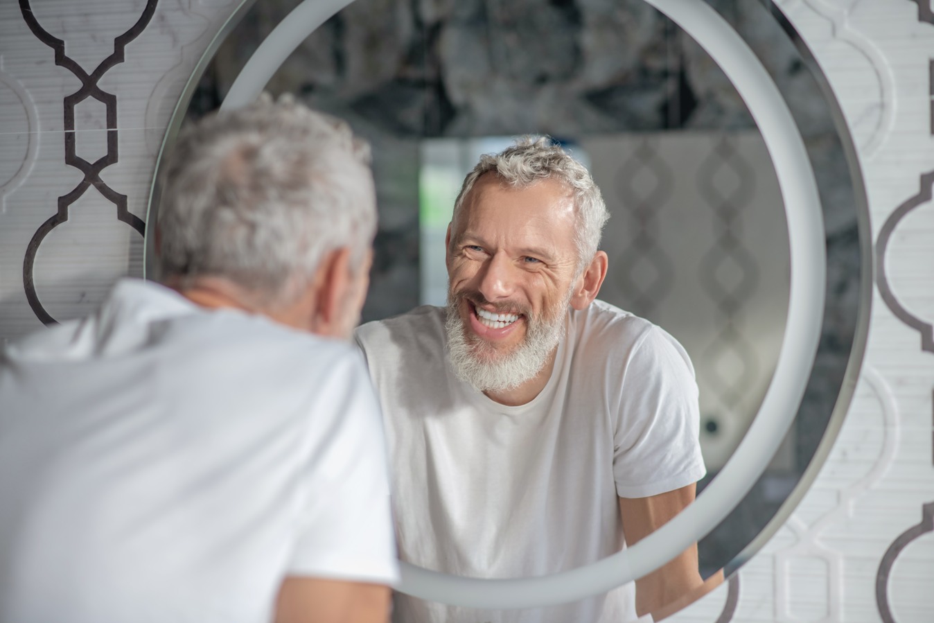 being-cool-smiling-grey-haired-man-looking-mirror